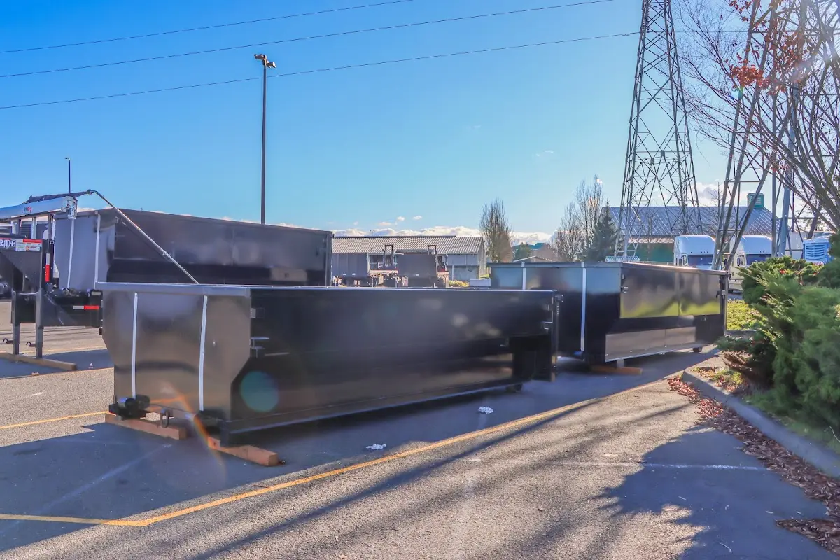 Roll-off dumpster ready for waste disposal at job site for 15 Yard Dumpster Rental in Plymouth